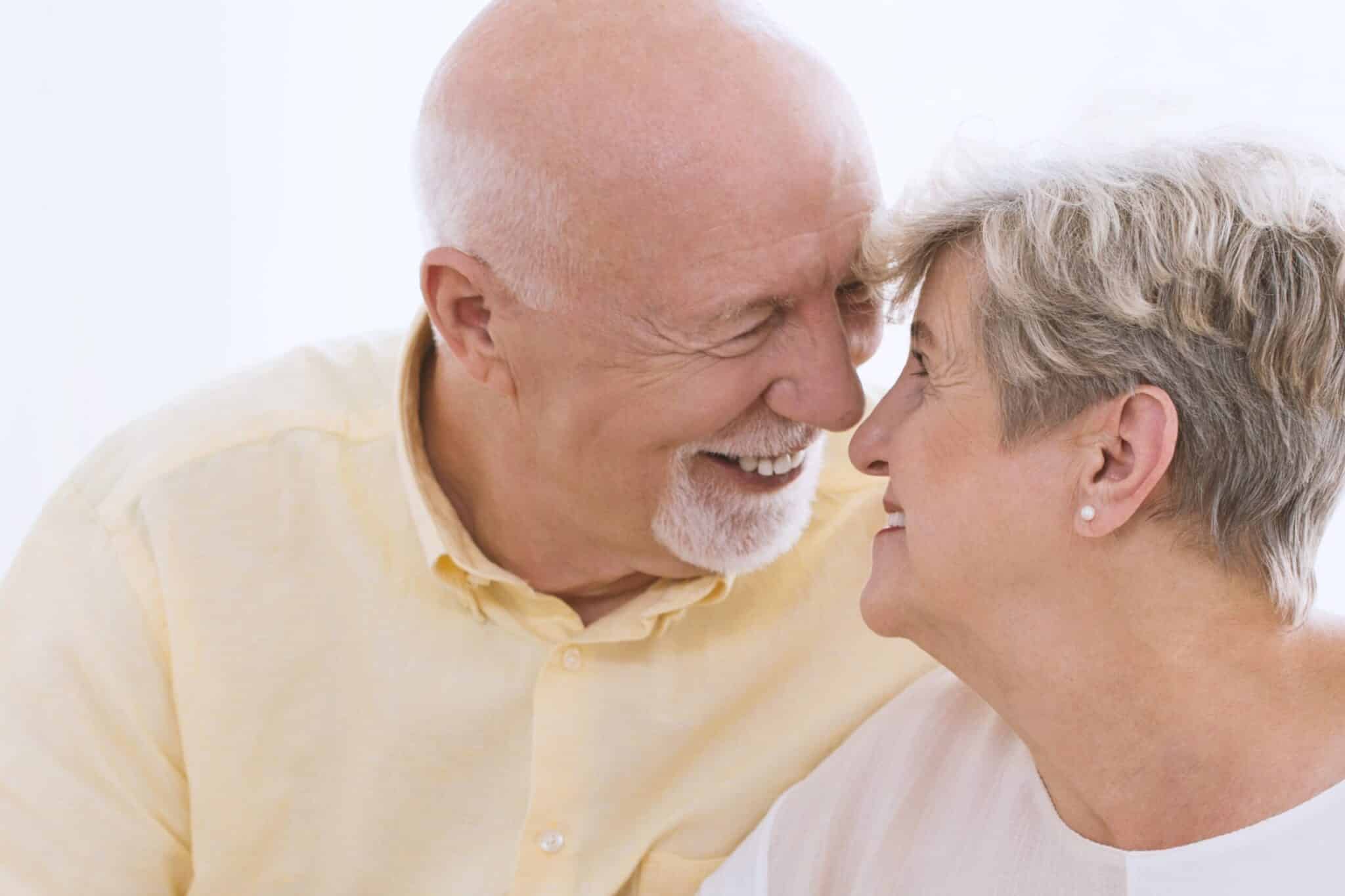 Older couple in a Long-term relationship looking deep into one another's eyes